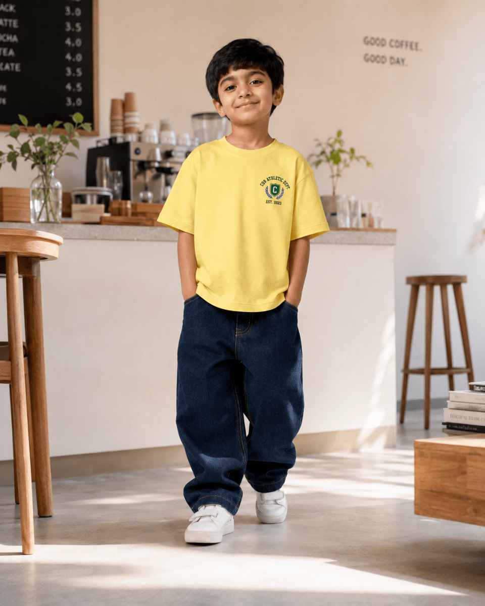 Boys oversized graphic t-shirt in pastel yellow, 23 Jersey print, Bold Cub Korean streetwear - lifestyle shot
