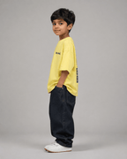 Boys oversized graphic t-shirt in pastel yellow, Be Bold print, Bold Cub Korean streetwear - detail shot
