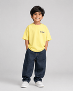 Boys oversized graphic t-shirt in pastel yellow, Be Bold print, Bold Cub Korean streetwear - front