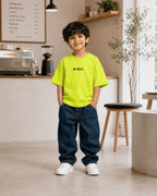 Boys oversized graphic t-shirt in neon lime, Be Kind print, Bold Cub Korean streetwear - lifestyle shot