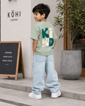 Boys oversized graphic t-shirt in sage green, Be Kind print, Bold Cub Korean streetwear - lifestyle shot