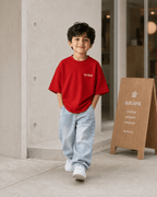 Boys oversized graphic t-shirt in red, Be Bold print, Bold Cub Korean streetwear - lifestyle shot