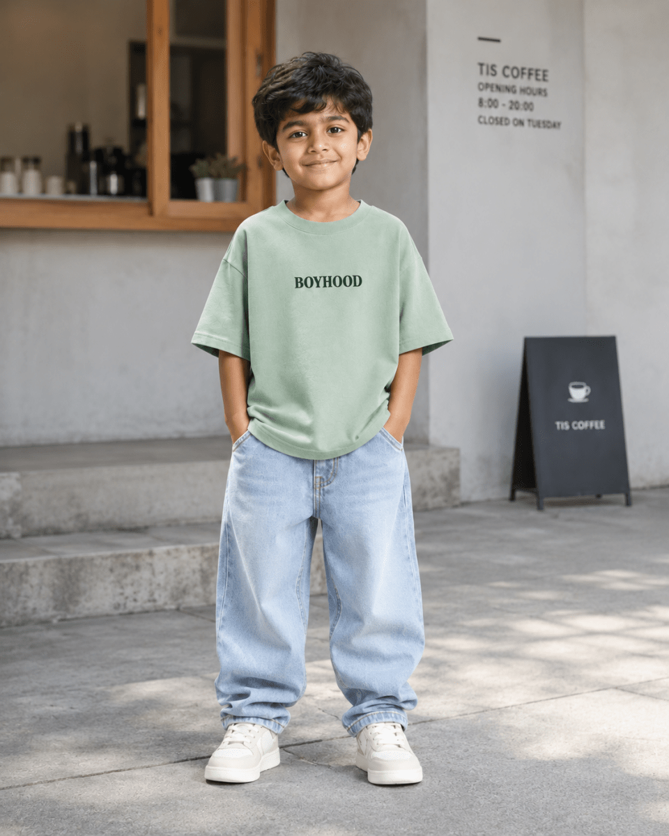 Boys oversized graphic t-shirt in sage green, Good Kid Bad Ideas print, Bold Cub Korean streetwear - lifestyle shot