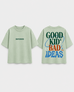 Boys oversized graphic t-shirt in sage green, Good Kid Bad Ideas print, Bold Cub Korean streetwear - flat lay