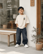 Boys oversized graphic t-shirt in off-white, Good Ideas Only print, Bold Cub Korean streetwear - lifestyle shot