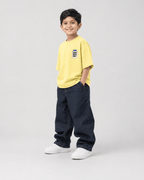 Boys oversized graphic t-shirt in pastel yellow, Good Ideas Only print, Bold Cub Korean streetwear - detail shot