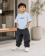 Boys oversized graphic t-shirt in sky blue, Good Kid Bad Ideas print, Bold Cub Korean streetwear - lifestyle shot