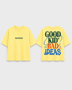 Boys oversized graphic t-shirt in pastel yellow, Good Kid Bad Ideas print, Bold Cub Korean streetwear - flat lay