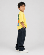 Boys oversized graphic t-shirt in pastel yellow, Good Kid Bad Ideas print, Bold Cub Korean streetwear - detail shot