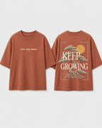 Boys oversized graphic t-shirt in Brown, Keep Growing print, Bold Cub Korean streetwear - flat lay