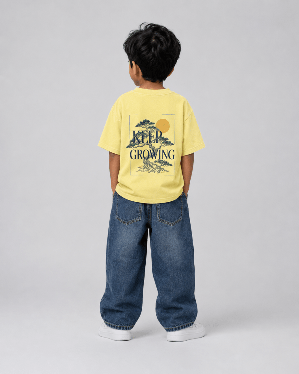 Boys oversized graphic t-shirt in pastel yellow, Keep Growing print, Bold Cub Korean streetwear - back