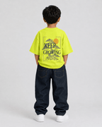 Boys oversized graphic t-shirt in neon lime, Keep Growing print, Bold Cub Korean streetwear - back