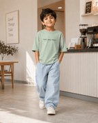 Boys oversized graphic t-shirt in sage green, Keep Growing print, Bold Cub Korean streetwear - lifestyle shot