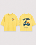 Boys oversized graphic t-shirt in pastel yellow, Road Trip print, Bold Cub Korean streetwear - flat lay