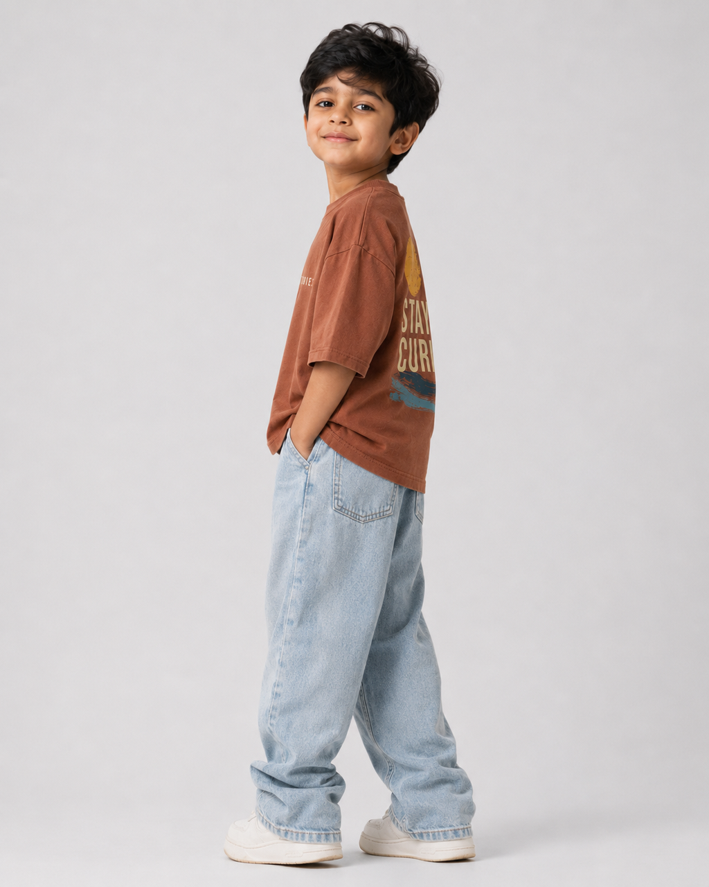 Boys oversized graphic t-shirt in Brown, Stay Curious print, Bold Cub Korean streetwear - detail shot