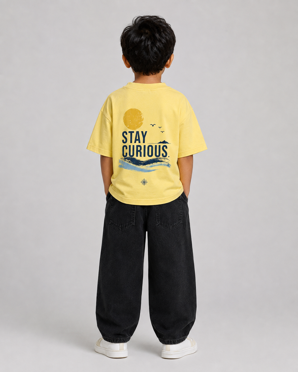 Boys oversized graphic t-shirt in pastel yellow, Stay Curious print, Bold Cub Korean streetwear - back