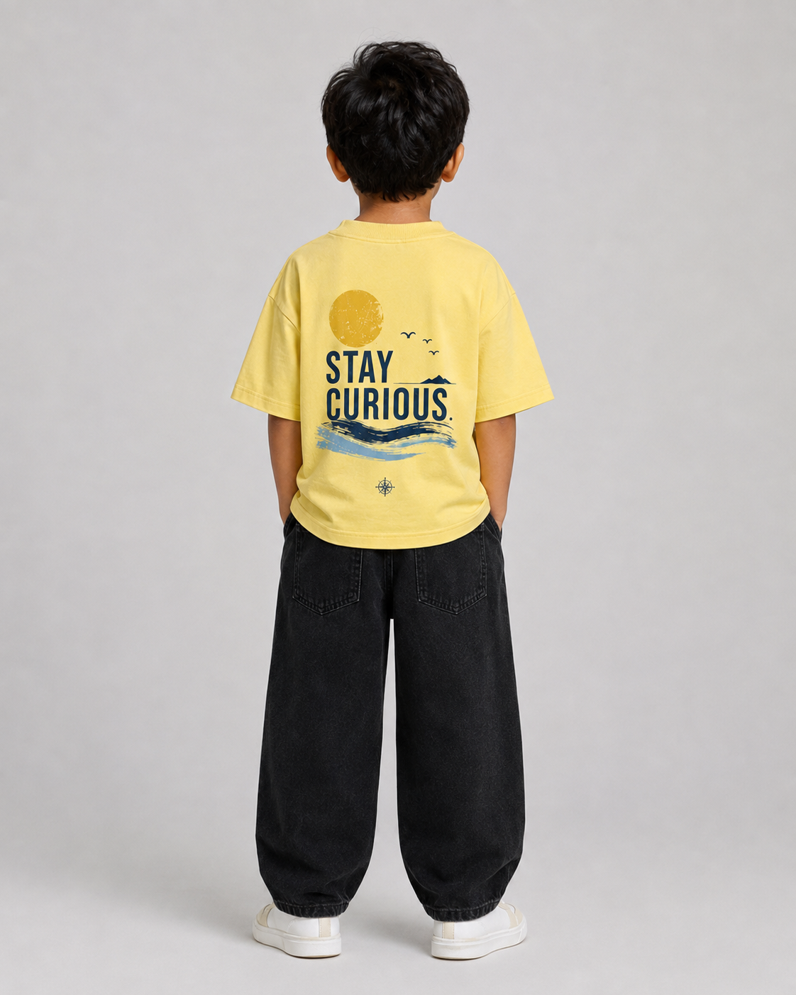 Boys oversized graphic t-shirt in pastel yellow, Stay Curious print, Bold Cub Korean streetwear - back