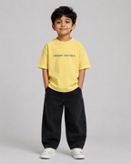 Boys oversized graphic t-shirt in pastel yellow, Stay Curious print, Bold Cub Korean streetwear - front