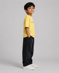 Boys oversized graphic t-shirt in pastel yellow, Stay Curious print, Bold Cub Korean streetwear - detail shot