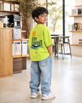 Boys oversized graphic t-shirt in neon lime, Stay Curious print, Bold Cub Korean streetwear - lifestyle shot