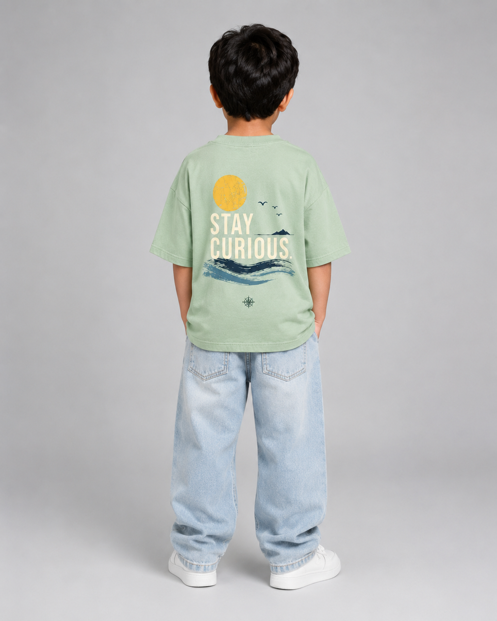 Boys oversized graphic t-shirt in sage green, Stay Curious print, Bold Cub Korean streetwear - back