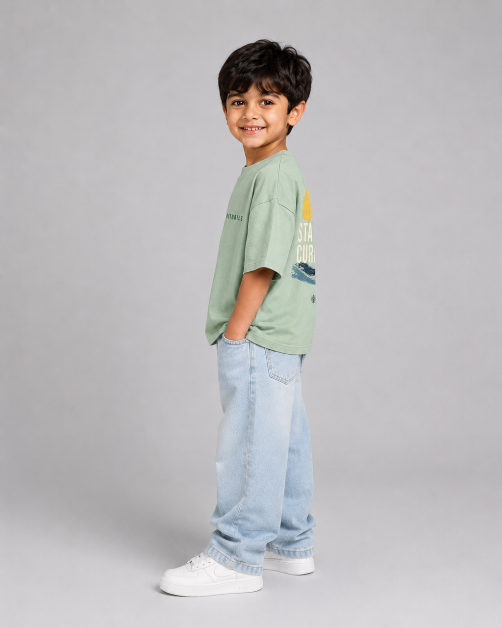 Boys oversized graphic t-shirt in sage green, Stay Curious print, Bold Cub Korean streetwear - detail shot