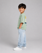 Boys oversized graphic t-shirt in sage green, Stay Curious print, Bold Cub Korean streetwear - detail shot