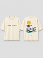 Boys oversized graphic t-shirt in off-white, Stay Curious print, Bold Cub Korean streetwear - flat lay